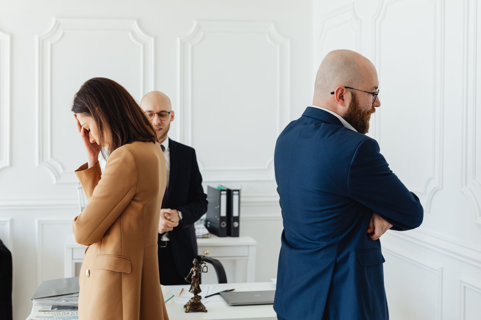 People standing in a quiet office